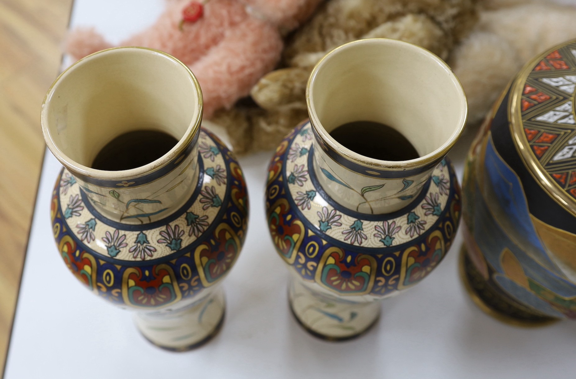 Two pairs of Japanese vases. Tallest 38cm